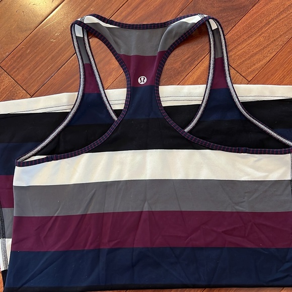 Lululemon tank. Likely size 12. Tore out tag. Great condition. - Picture 2 of 2